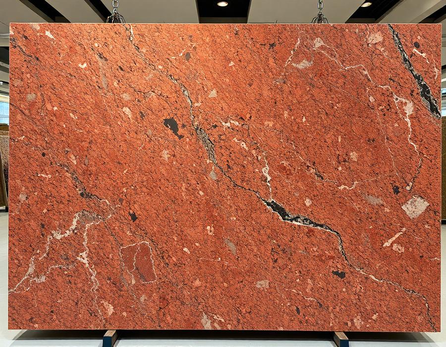Red multicolour granite slab with red, brown and grey patterning